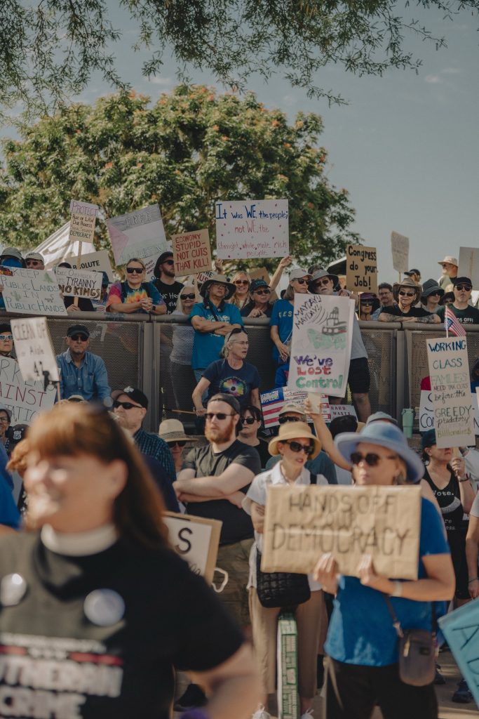Wide angle image of protest gathering at Arizona State Capitol.