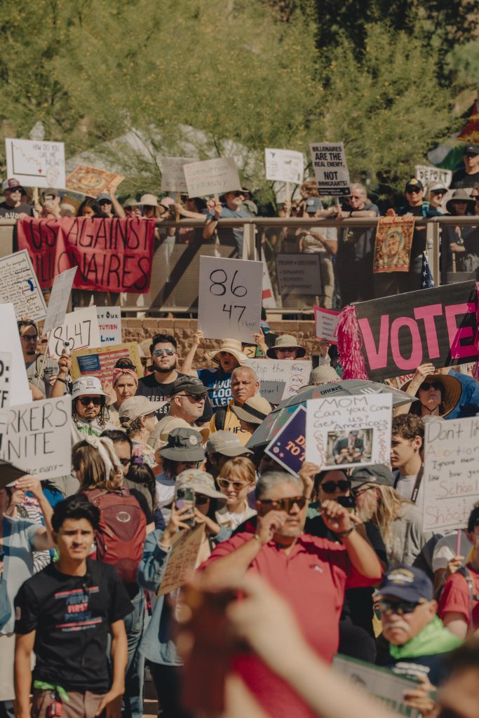 Wide angle shot of protest gathering at the Arizona State Capitol.
