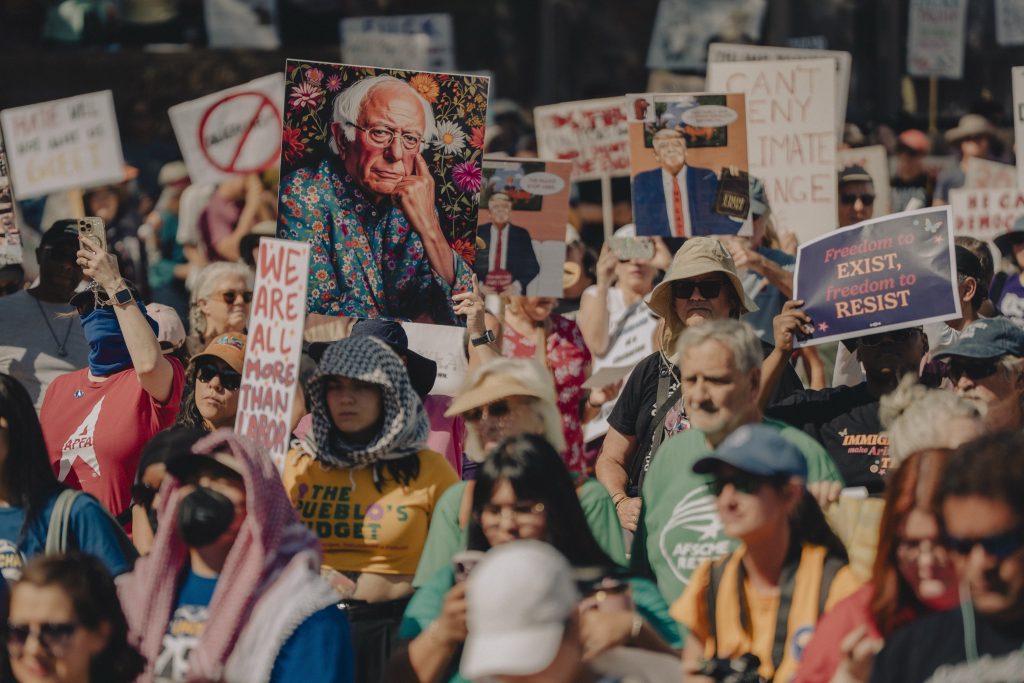 Wide angle image of protest gathering at Arizona State Capitol.