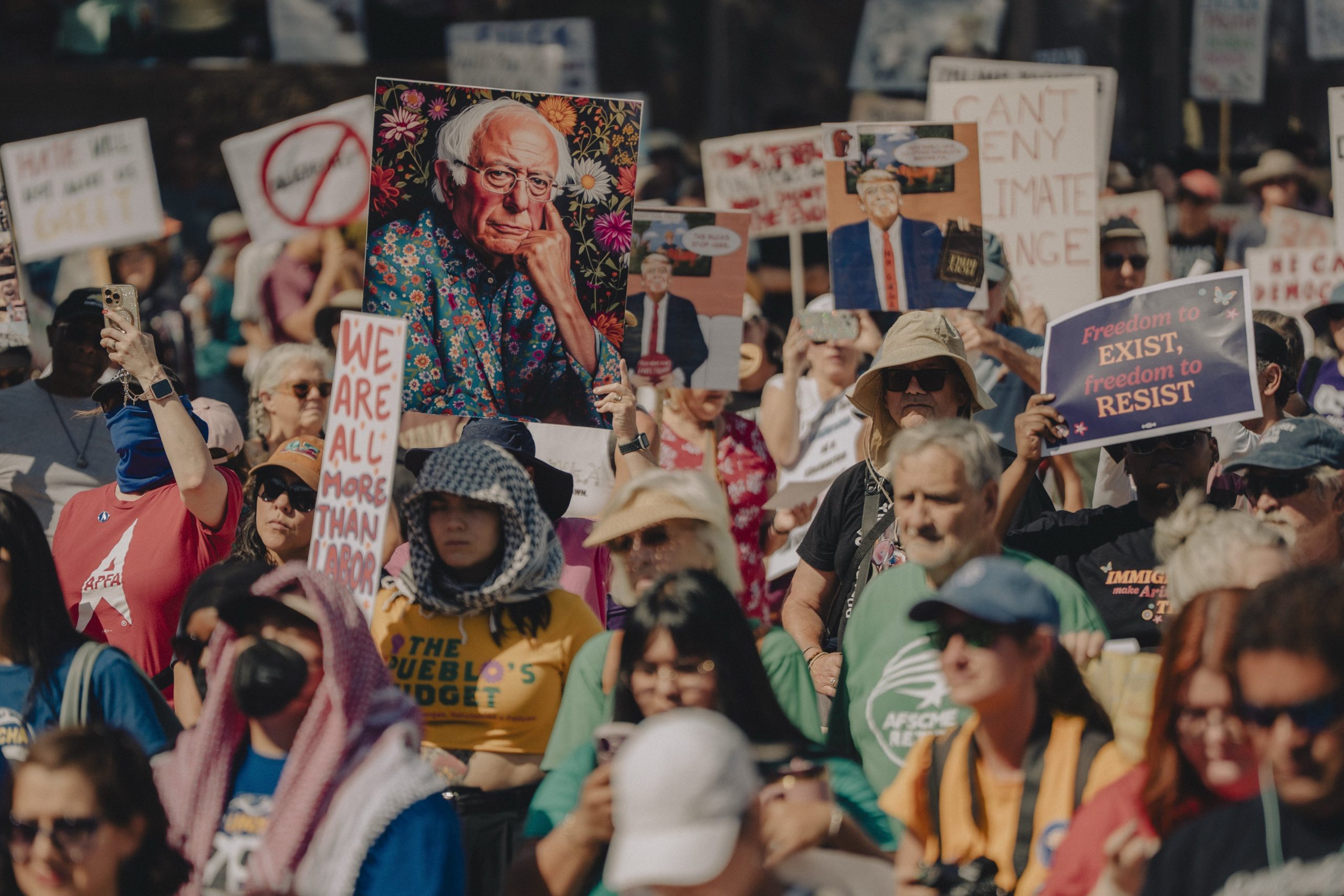 Wide angle image of protest gathering at Arizona State Capitol.