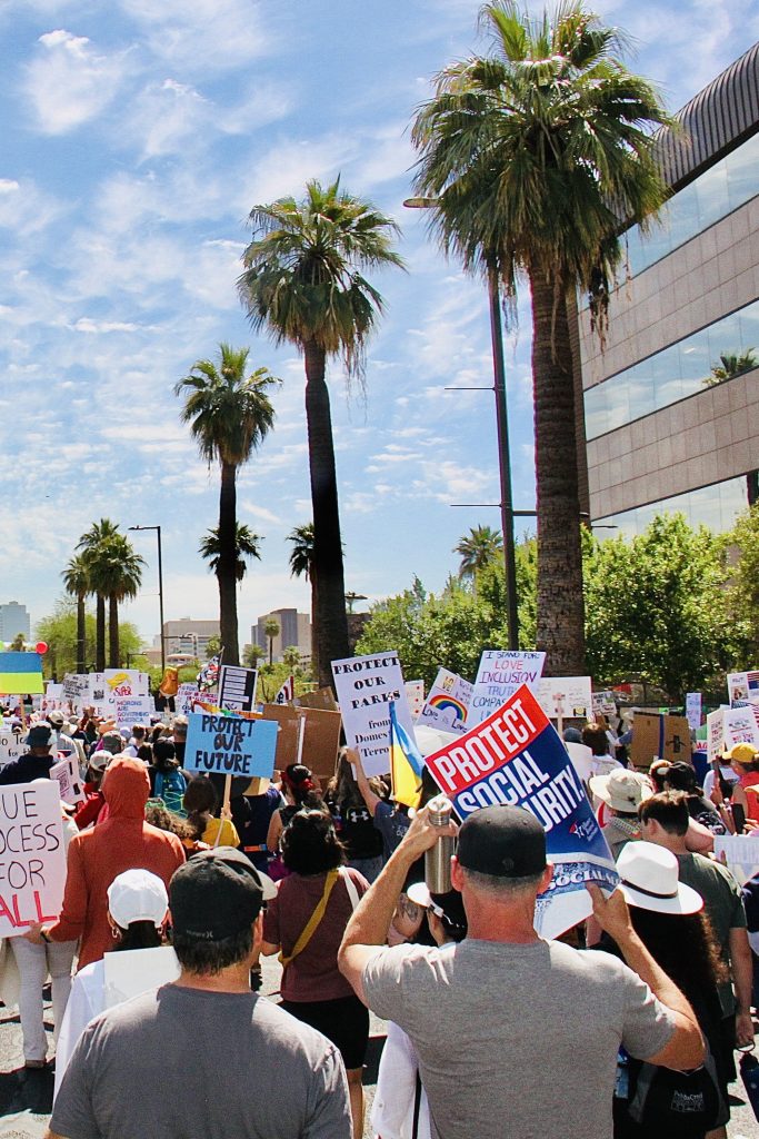 Back view of protest march heading East towards Downtown Phoenix
